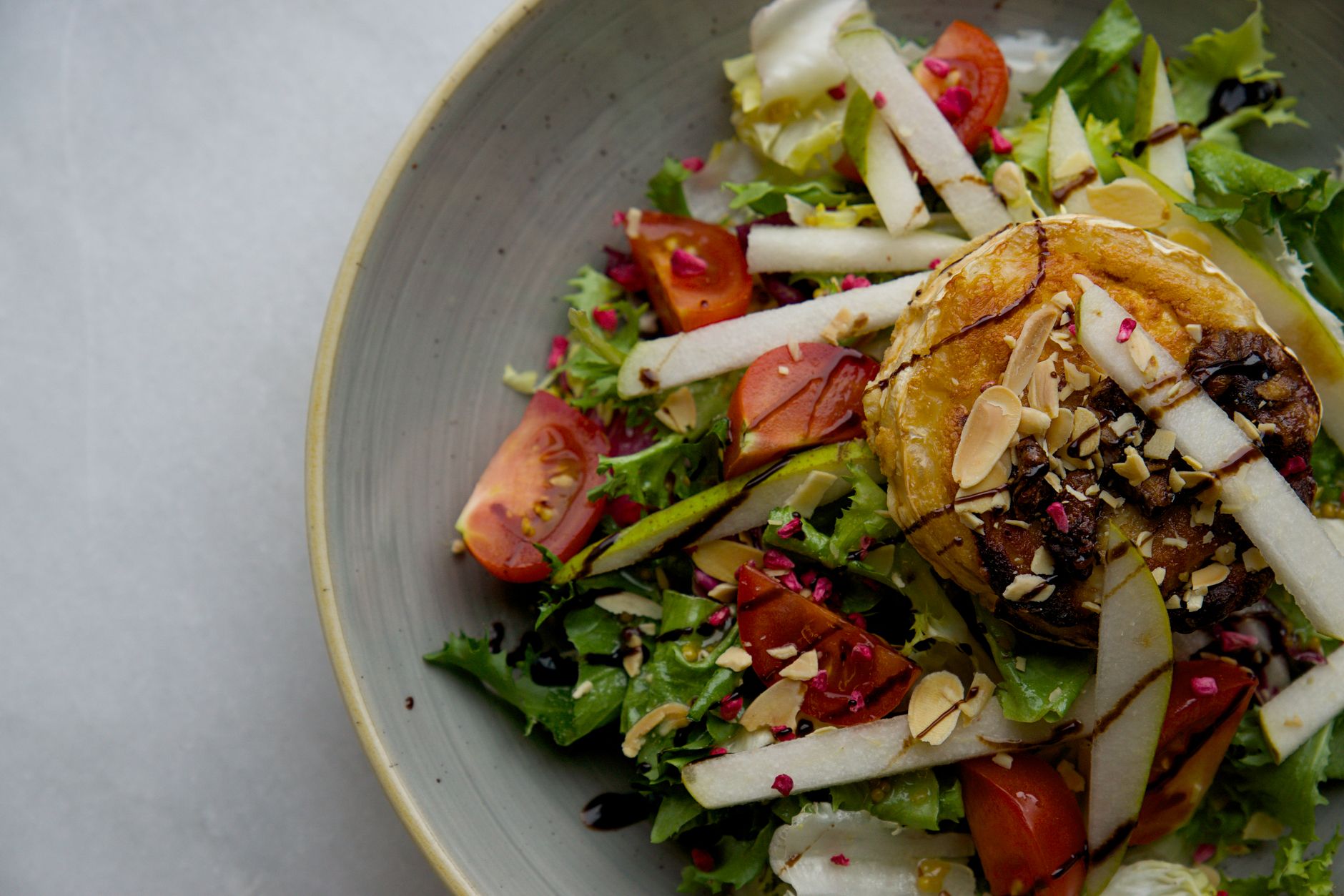 Harissa veg, goat’s cheese & couscous salad