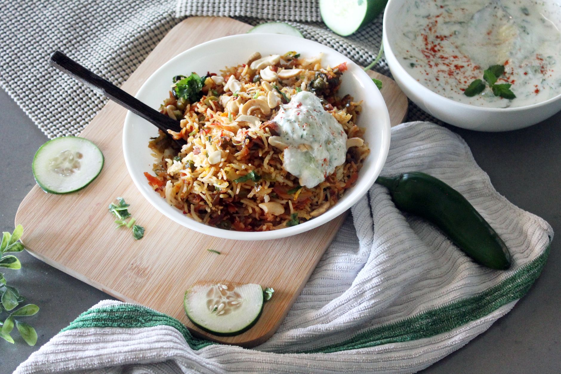 Vegetable biryani with green raita