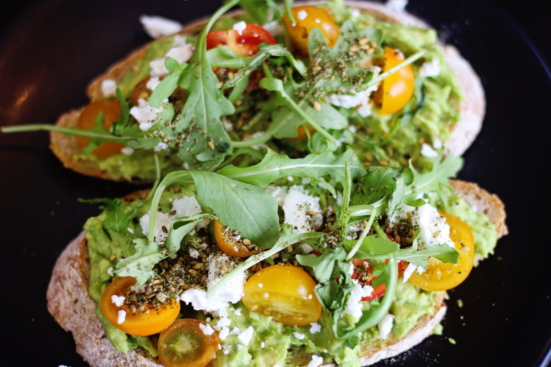 Ricotta toasts with rocket & pine nut salsa