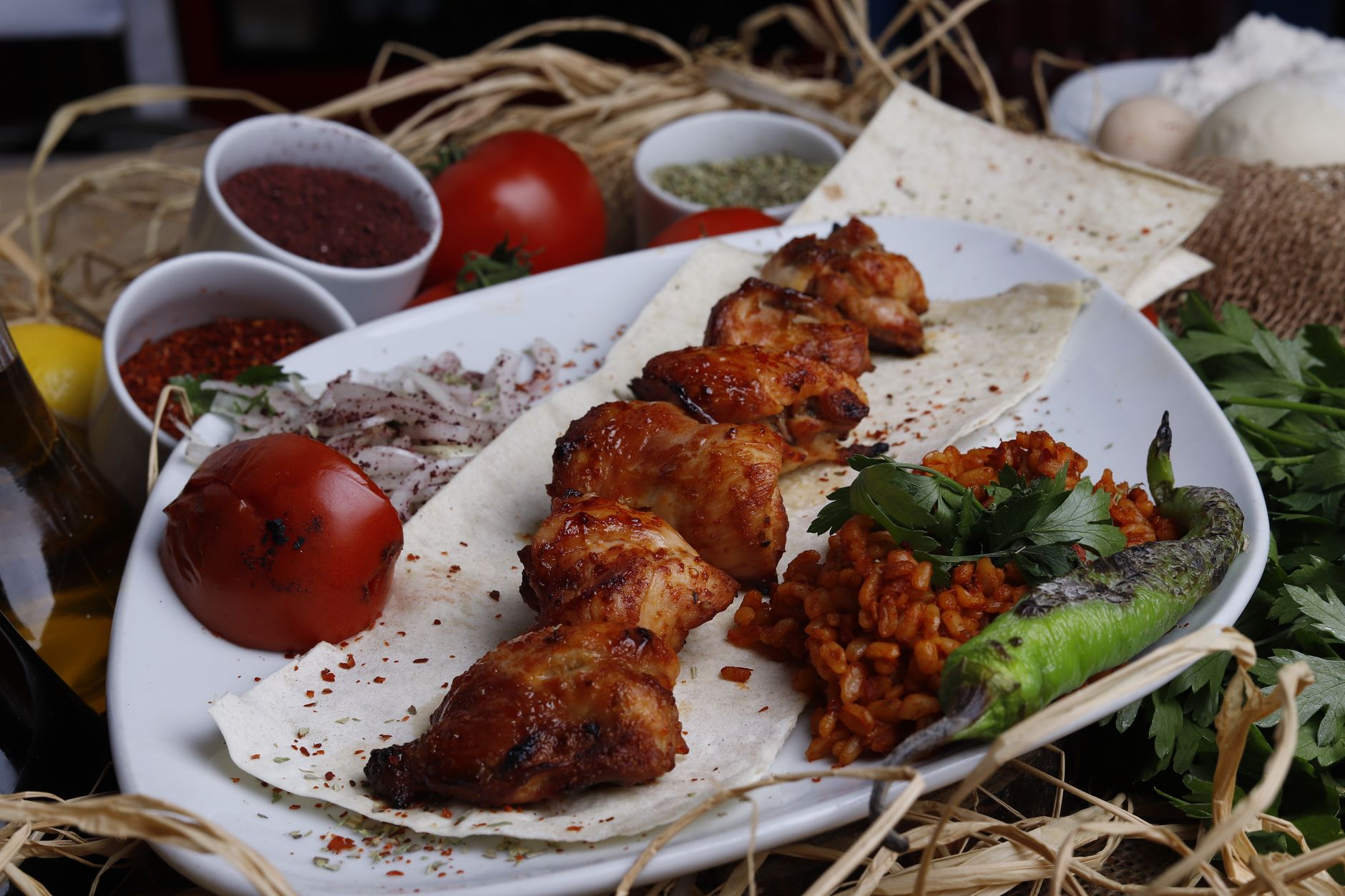 Preserved lemon chicken skewers with summer tomato salad