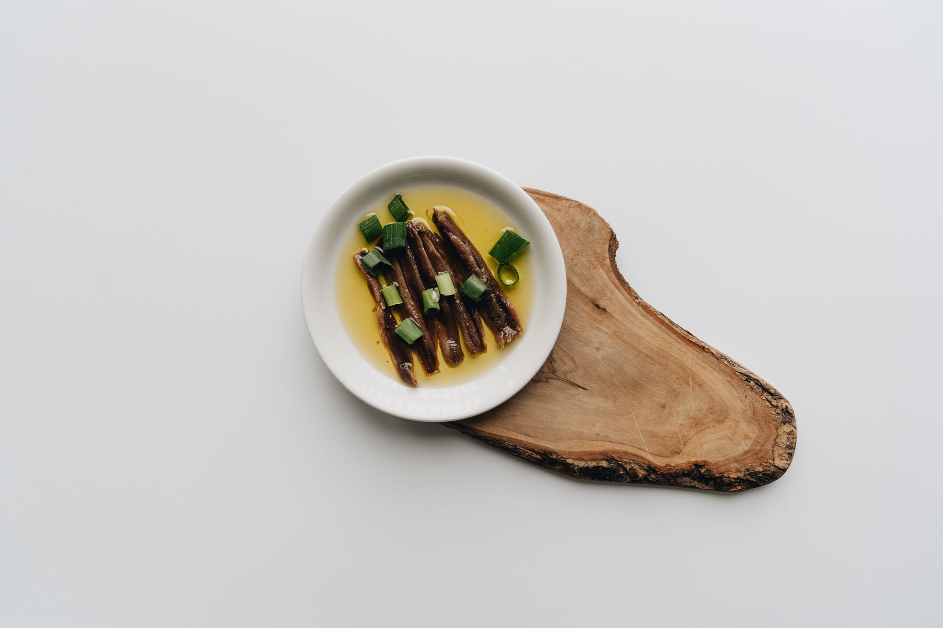 Charred leeks with anchovy dressing