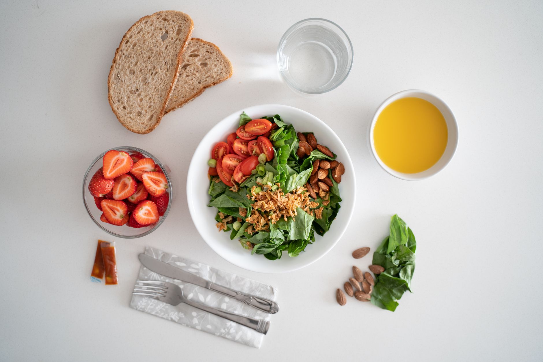 Strawberry, tomato & watercress salad with honey & pink pepper dressing