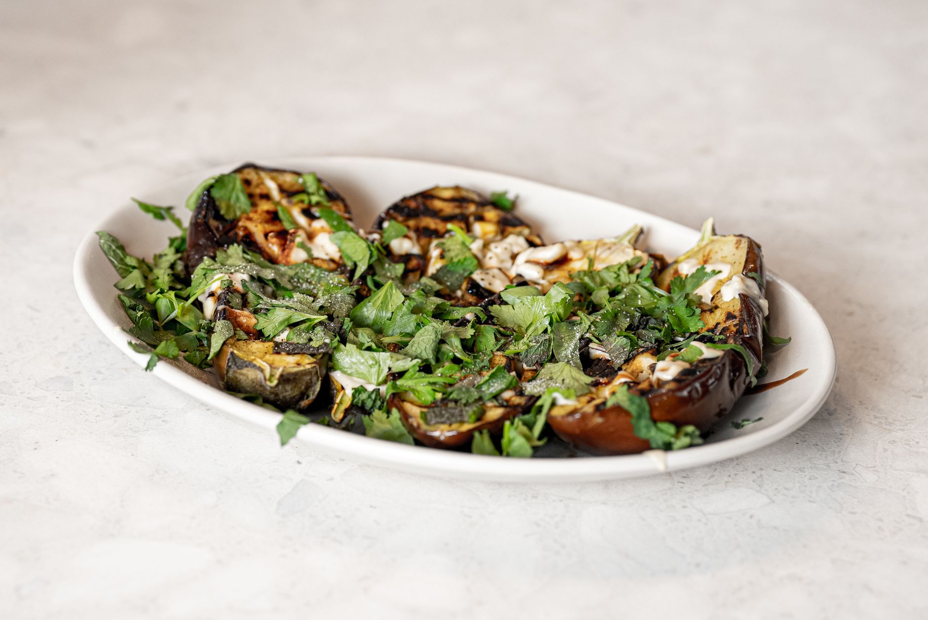 Roasted Eggplant With Tahini, Pine Nuts, and Lentils