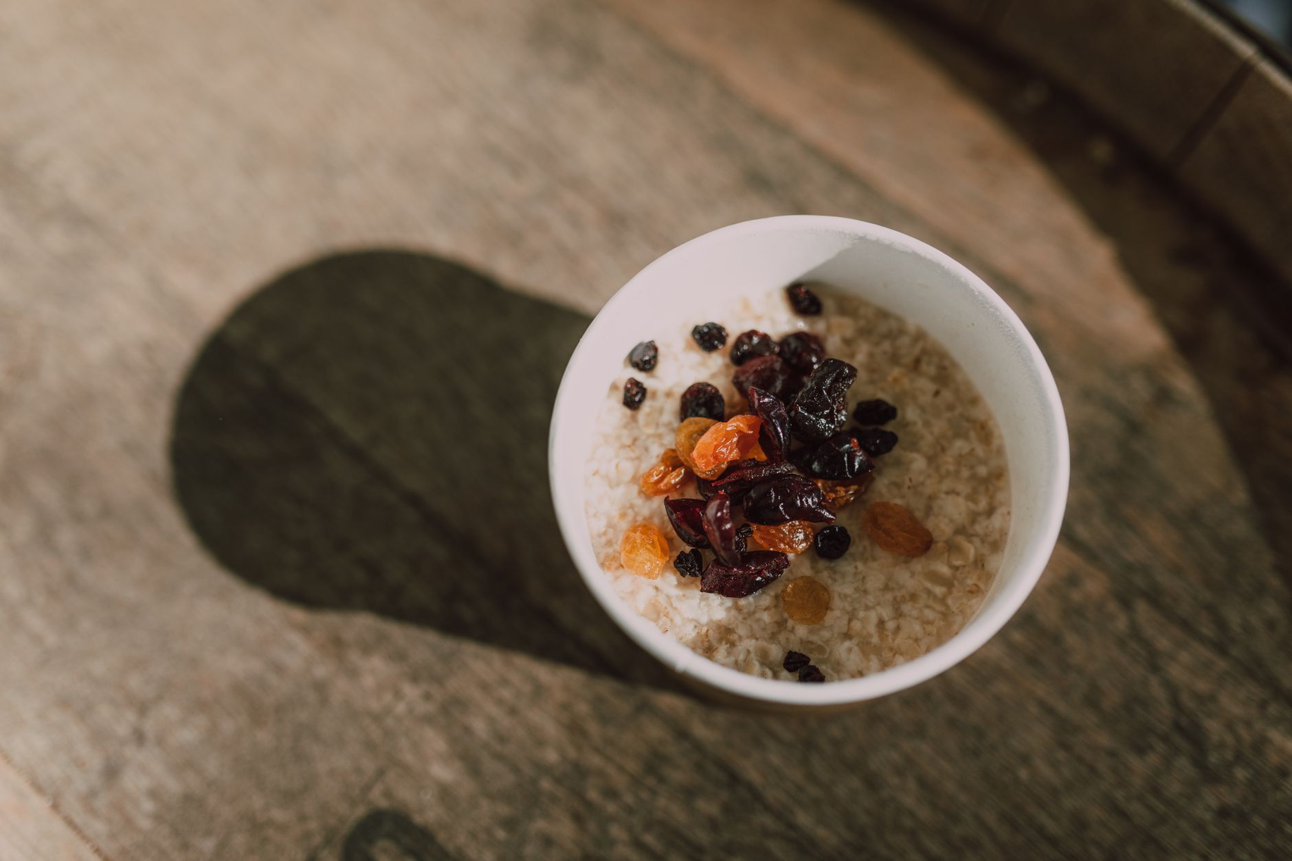 Plum, raisin & granola porridge topper