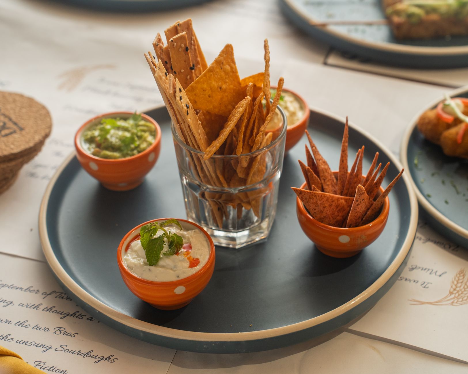 Pick & dip filo straws with feta, dates & sesame seeds